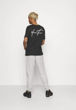 YOURTURN Unisex - Trainingsbroek - Mottled Light Grey -Yourturn 44af697d8af34693a7b3385401313f6d