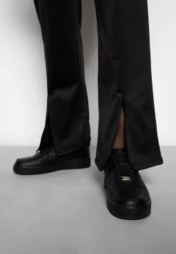 YOURTURN Unisex - Trainingsbroek - Black -Yourturn 5c4f8c8cb63e40f79401d8fdfffc3743