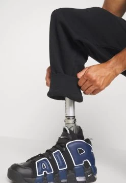 YOURTURN Unisex - Trainingsbroek - Black -Yourturn 96890d6b49c24a0ca097867b183abe35